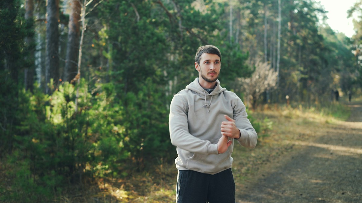Man stretching outdoors