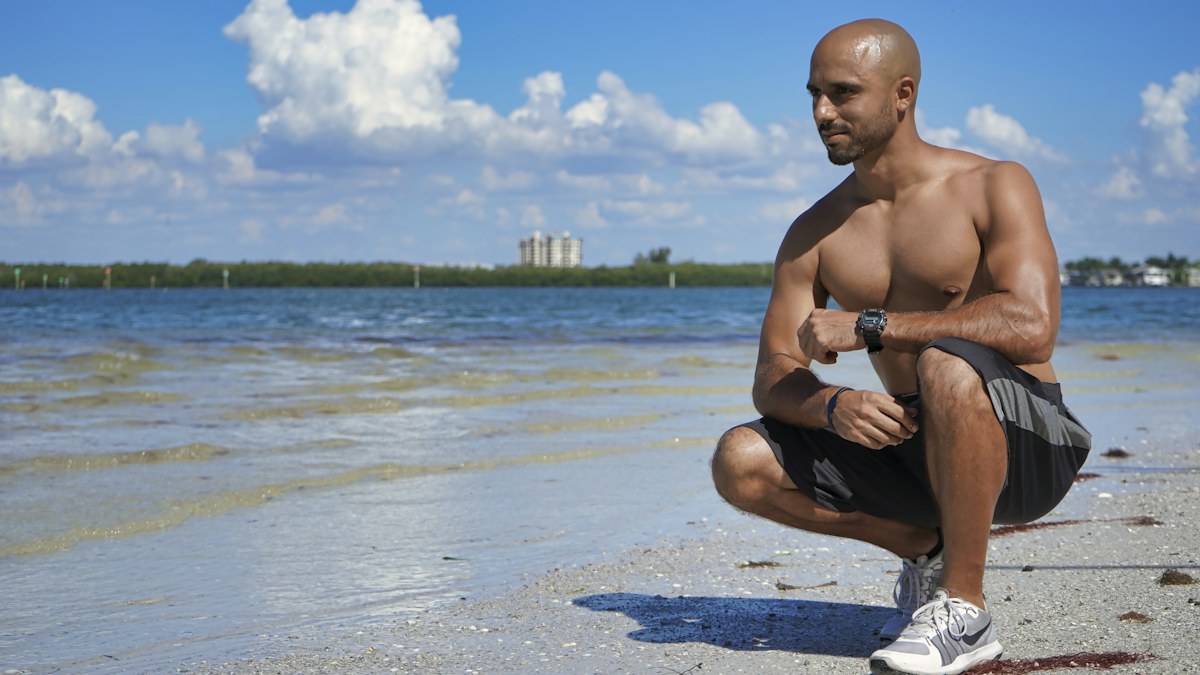 Man on a beach in an active lifestyle setting