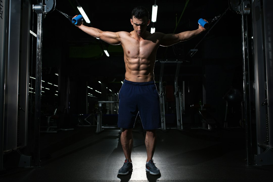 Man strength training in a gym