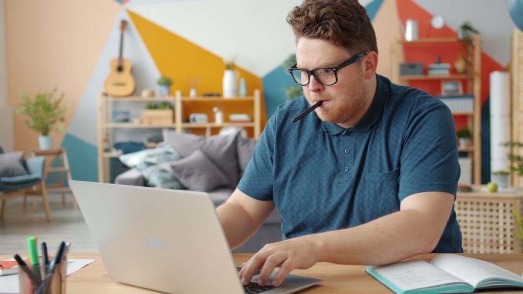 Modern professional laptop workspace for planning AI prompting projects